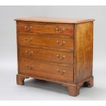 A 19th Century mahogany chest of 4 long graduated drawers with swan neck drop handles, raised on