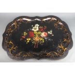 A Victorian papier mache tray with bracketed border, the centre with floral decoration 78cm x 60cm