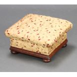 A Victorian cushion shaped stool raised on bun feet 17cm h x 36cm w x 36cm d