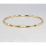 A 9ct yellow gold bangle 5.6 grams