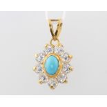 A 22ct yellow gold turquoise and paste pendant 2.8 grams, 25mm