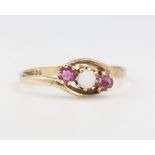 A 9ct yellow gold open ruby ring, 1.6 grams, size N