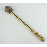 A Victorian gong beater with carved bone handle