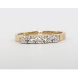 A 9ct yellow gold 5 stone diamond ring 2.1 grams, size N