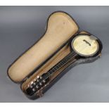 An 8 stringed banjo mandolin patent no. 25221-45 complete with carrying case