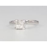 An 18ct white gold 4 stone princess cut diamond ring approx. 0.5ct, colour G/H, clarity VS, size O