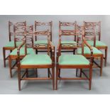 A set of 8 Georgian style mahogany bar back dining chairs with pierced mid rails, upholstered drop