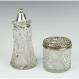 An Edwardian silver mounted sugar shaker, Sheffield 1909, ditto toilet jar