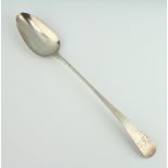 A George III silver gravy spoon with engraved monogram, London 1802, 93 grams
