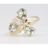 A 9ct yellow gold gem set ring, 3 grams, size N 1/2