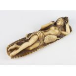 A composition carved figure of a reclining naked Chinese lady 20cm