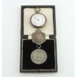 A lady's Edwardian silver fob watch with enamelled dial, 2 silver fobs The fob enamel is cracked