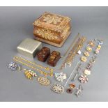 A collection of minor costume jewellery including brooches, earrings, etc contained in an oak
