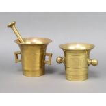 A 17th/18th Century gilt metal twin handled mortar 12cm x 3cm (chip to the rim) together with an