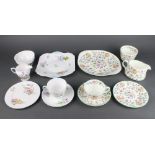A Minton Haddon Hall part tea set comprising 6 tea cups, 6 saucers, 1 sugar bowl, 6 sandwich plates,