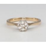 A 9ct yellow gold diamond cluster ring approx. 0.25ct, size M, 2.3 grams