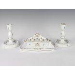 A Herend Hvngary inkstand with 2 inkwells and pen tray together with matching candlesticks decorated