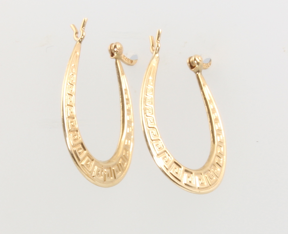 A pair of 9ct yellow gold engraved hoop earrings, 1 gram These earrings are in good condition and