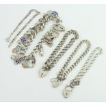 A silver charm bracelet and minor silver jewellery 132 grams