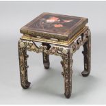 A 1930's Chinese square lacquered occasional table the top decorated a bird with flowers, having a