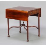 A Victorian mahogany Pembroke table fitted 2 frieze drawers raised on chamfered supports with X