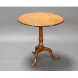 A Georgian light oak snap top tea table raised on a turned column and tripod base 67cm h x 68cm w