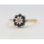 An 18ct yellow gold sapphire and diamond cluster ring size P, 3.3 grams