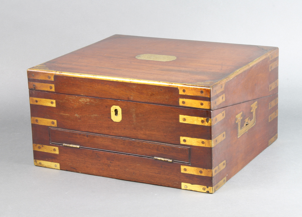 A Georgian mahogany and brass banded writing slope with hinged lid and secret drawer 18cm h x 35cm w