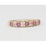 A 9ct yellow gold ruby and diamond ring, 1.1 grams, size K