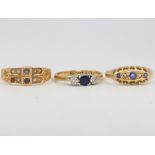 A 15ct yellow gold sapphire and pearl ring size O, 3 grams, 2 18ct sapphire and diamond rings size