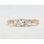An 18ct yellow gold 3 stone diamond ring approx. 0.5ct, 2.7 grams, size M,