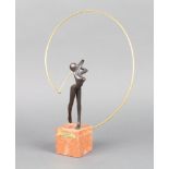 Bernard Rives, a limited edition bronze sculpture of a female golfer "Swing" no.69/999, raised on
