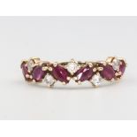 A 9ct yellow gold ruby and diamond ring, 1.9 grams, size L