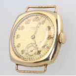 A gentleman's 14ct yellow gold Longines wristwatch with seconds at 6 o'clock the dial inscribed