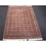 Wilton, a Nazareth Salome Rug, heavy duty machine made brown, black and white ground Bokhara style