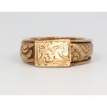 A 19th Century chased yellow gold signet ring with in memoriam envelope, 10.4 grams, size R