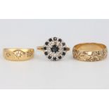 A 9ct yellow gold wedding band 3.1 grams, size N, a high carat yellow gold diamond ring 3.2 grams