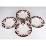 Ten Royal Crown Derby Imari pattern soup bowls 26cm Some of the gilt rim is worn