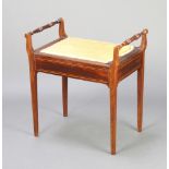 An Edwardian inlaid mahogany box seat piano stool raised on square tapered supports 60cm x 56cm x