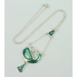 An Art Nouveau style silver and enamelled open pendant and chain