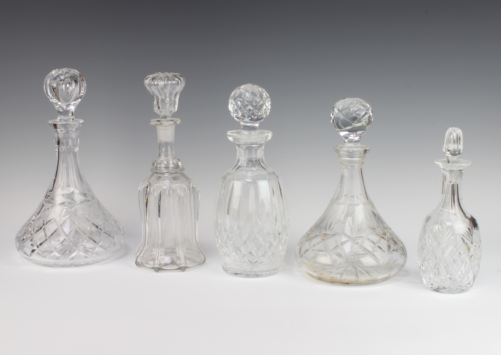 A spirit decanter and stopper 20cm, 2 ships decanters and 2 others Two of the decanters are chipped