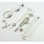 A silver charm bracelet and a quantity of silver jewellery