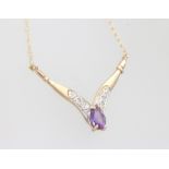 A 9ct yellow gold amethyst pendant and chain, 1.5 grams