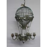 Kevin McCloud, a verdigris metalled 6 light candle chandelier in the form of a Montgolfier balloon
