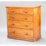 A Victorian mahogany D shaped chest of 2 short and 3 long drawers with tore handles, raised on a