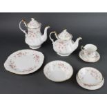 A Royal Albert Victoriana rose pattern tea and dinner service comprising 10 tea cups, 10 saucers,