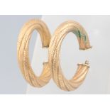 A pair of 9ct yellow gold engine turned hoop earrings 4.2 grams