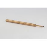 A 9ct yellow gold engine turned propelling pencil 7cm