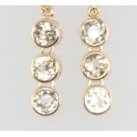 A pair of 9ct yellow gold gem set triple drop earrings, 3.5 grams