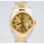 A gentleman's Rolex Oyster perpetual datejust calendar wristwatch, contained on a bi-metallic